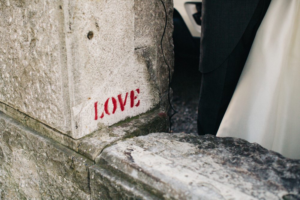 Love graffitti...next to the couples feet.